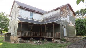The Beuter house exterior is being cleaned up by Zoar Community Association.